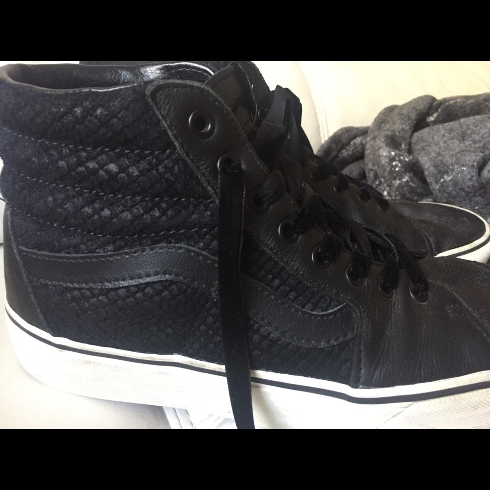 Vans black shoes.